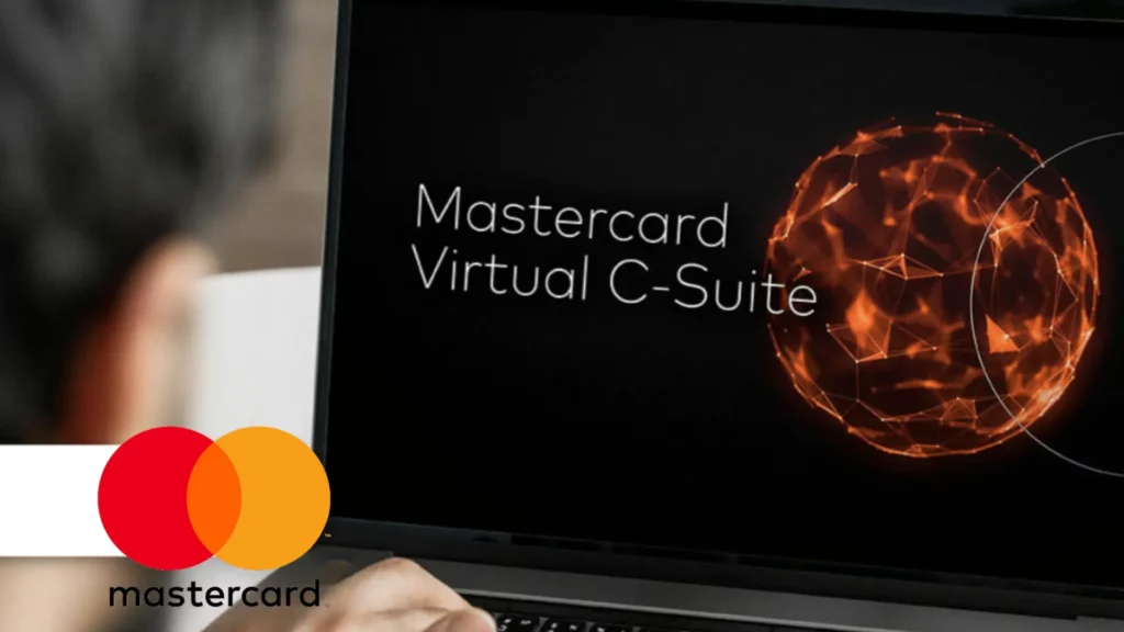 Schermo di laptop che mostra Mastercard Virtual C-Suite con logo Mastercard in primo piano